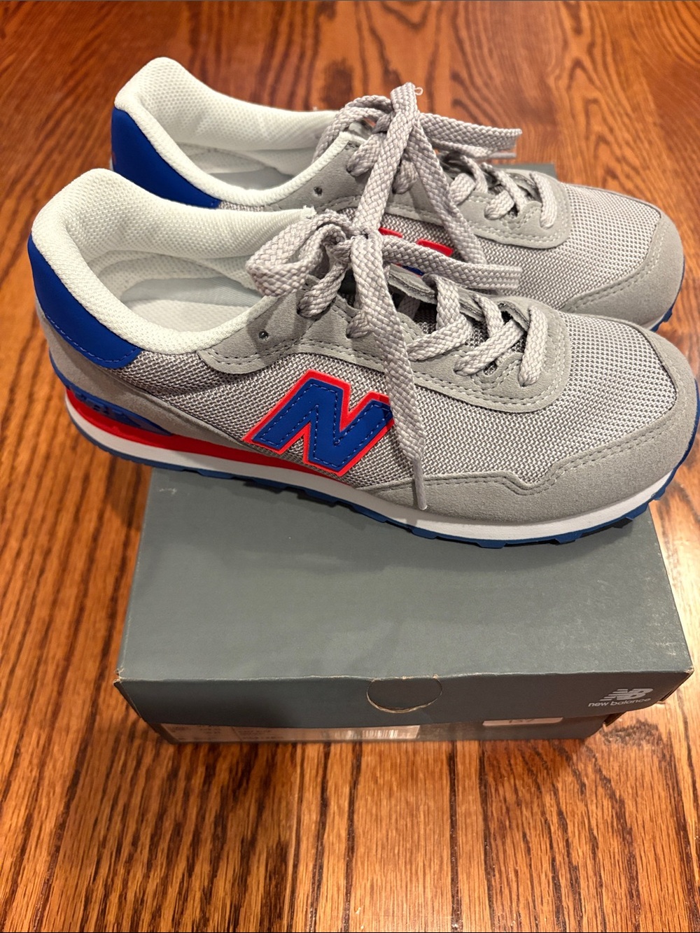 New Balance Kids Grey Sneakers with Blue & Red Trim